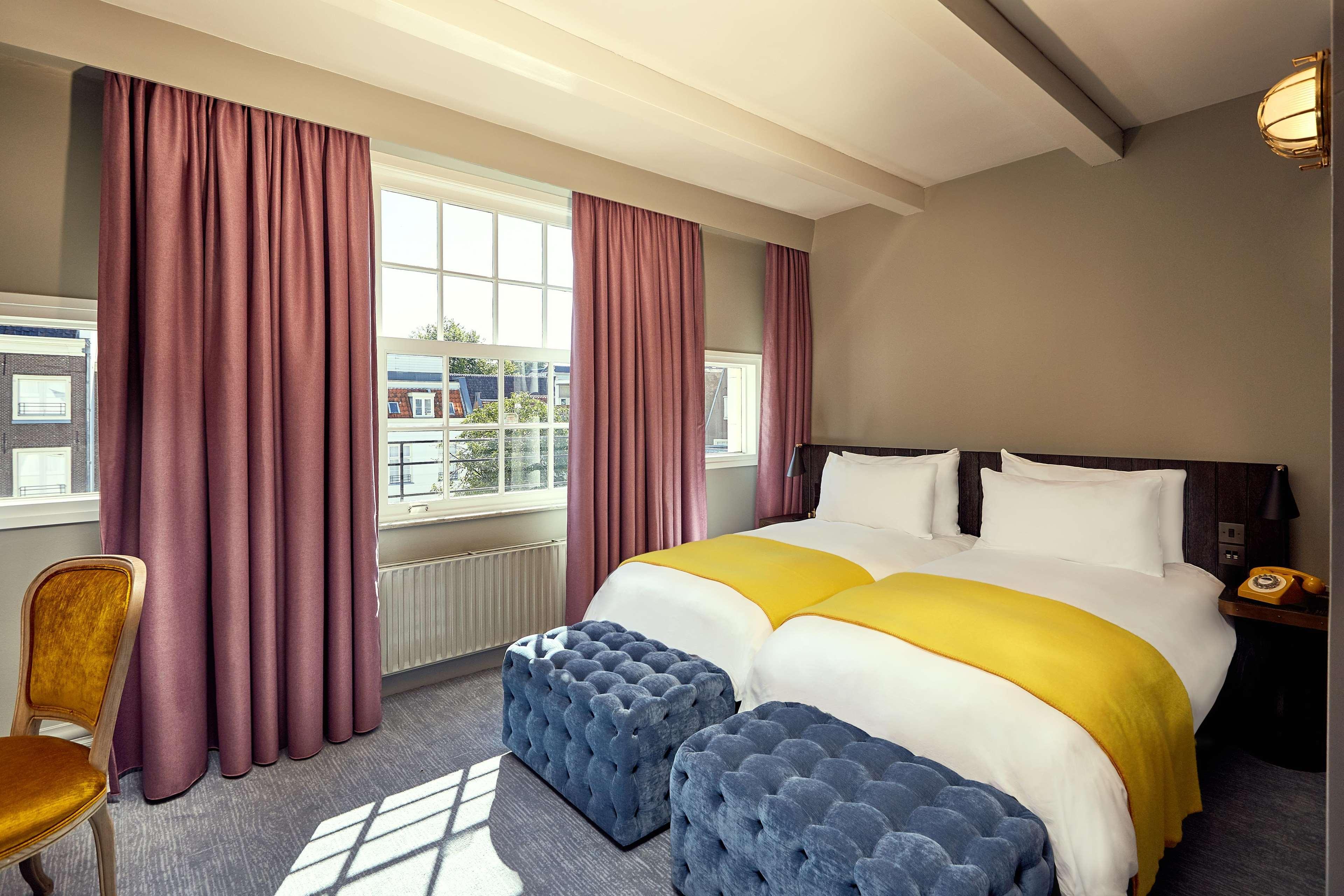 Pulitzer Amsterdam Hotel Exterior foto A bedroom at the hotel